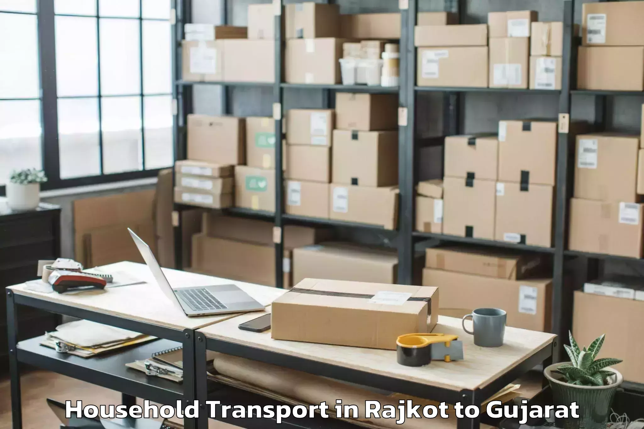 Reliable Rajkot to Anand Agricultural University Household Transport